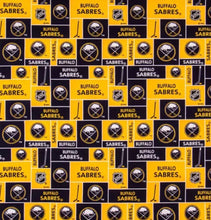 Load image into Gallery viewer, Solid Black Scrub Top with BUFFALO SABRES Hockey Fabric on *Neck Band & Pocket Options* Medical Scrub Top Unisex Style Shirt for Men & Women