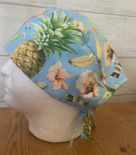 Load image into Gallery viewer, Hawaiian Pineapple Hibiscus Flowers Gecko Lizard Blue Fabric Unisex Medical Surgical Scrub Caps Men & Women Tie Back and Bouffant Hat Styles