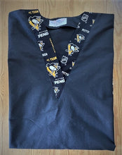 Load image into Gallery viewer, Solid Black Scrub Top with Pittsburg Penguins Hockey Fabric on *Neck Band & Pocket Options* Medical Scrub Top Unisex Style Shirt for Men & Women