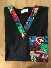 Load image into Gallery viewer, Solid Black Scrub Top with Super Heroes Packed Fabric on *Neck Band & Pocket Options* Medical Scrub Top Unisex Style Shirt for Men & Women