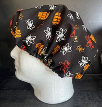 Load image into Gallery viewer, BIG BANG THEORY Black Fabric Unisex Medical Surgical Scrub Caps Men & Women Tie Back and Bouffant Hat Styles