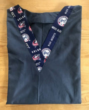 Load image into Gallery viewer, Solid Navy Scrub Top with Columbus Blue Jackets Hockey Fabric on *Neck Band & Pocket Options* Medical Scrub Top Unisex Style Shirt for Men & Women