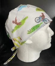 Load image into Gallery viewer, Curious George Monkey Flying a Kite, Riding a Bike White Fabric Unisex Medical Surgical Scrub Caps Men & Women Tie Back and Bouffant Hat Styles