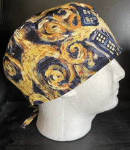 Load image into Gallery viewer, BBC Doctor Who Show EXPLODING TARDIS DR WHO Fabric Unisex Medical Surgical Scrub Caps Men & Women Tie Back and Bouffant Hat Styles