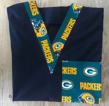 Load image into Gallery viewer, Solid Black Scrub Top with Green Bay Packers Football Fabric on *Neck Band & Pocket Options* Medical Scrub Top Unisex Style Shirt for Men & Women