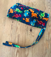 Load image into Gallery viewer, Dinosaur Toss Fabric Unisex Medical Surgical Scrub Caps Men & Women Tie Back and Bouffant Hat Styles