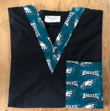 Load image into Gallery viewer, Solid Black Scrub Top with Philadelphia Eagles Football Fabric on *Neck Band & Pocket Options* Medical Scrub Top Unisex Style Shirt for Men & Women