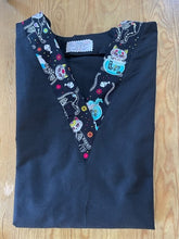 Load image into Gallery viewer, Solid Black Scrub Top with Cat Day of the Dead Skeleton Fabric on *Neck Band & Pocket Options* Medical Scrub Top Unisex Style Shirt for Men & Women