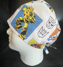 Load image into Gallery viewer, Transformers More Than Meets the Eye White Fabric Unisex Medical Surgical Scrub Caps Men & Women Tie Back and Bouffant Hat Styles