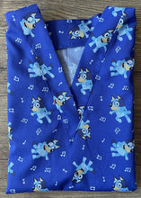 Load image into Gallery viewer, BLUEY Cartoon Inspired Dancing Musical Notes Blue Medical Scrub Top Unisex Style for Men &amp; Women
