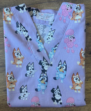 Load image into Gallery viewer, BLUEY Cartoon Inspired Playful Bluey and Friends purple Medical Scrub Top Unisex Style for Men &amp; Women
