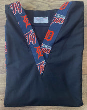 Load image into Gallery viewer, Solid Black Scrub Top with Detroit Tigers Baseball Fabric on *Neck Band &amp; Pocket Options* Medical Scrub Top Unisex Style Shirt for Men &amp; Women
