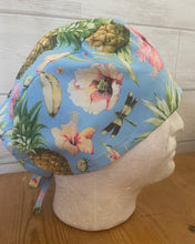 Load image into Gallery viewer, Hawaiian Pineapple Hibiscus Flowers Gecko Lizard Blue Fabric Unisex Medical Surgical Scrub Caps Men &amp; Women Tie Back and Bouffant Hat Styles
