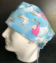 Load image into Gallery viewer, Special Delivery Stork Delivering Babies Nursery Fabric Unisex Medical Surgical Scrub Caps Men &amp; Women Tie Back and Bouffant Hat Styles
