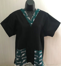 Load image into Gallery viewer, Solid Black Scrub Top with Philadelphia Eagles Football Fabric on *Neck Band &amp; Pocket Options* Medical Scrub Top Unisex Style Shirt for Men &amp; Women
