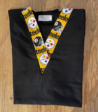 Load image into Gallery viewer, Solid Black Scrub Top with Steelers Football Fabric on *Neck Band &amp; Pocket Options* Relaxed Style Unisex Mens Scrub Top Womens Scrub Top
